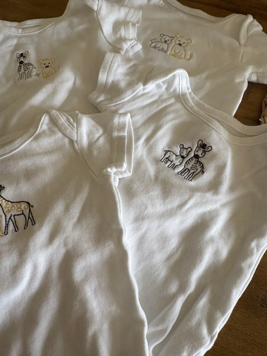 Cache-couches (4) new born