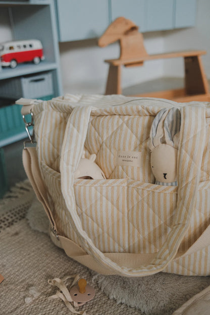 Sac à couche en coton biologique collection rayée - Dans le sac