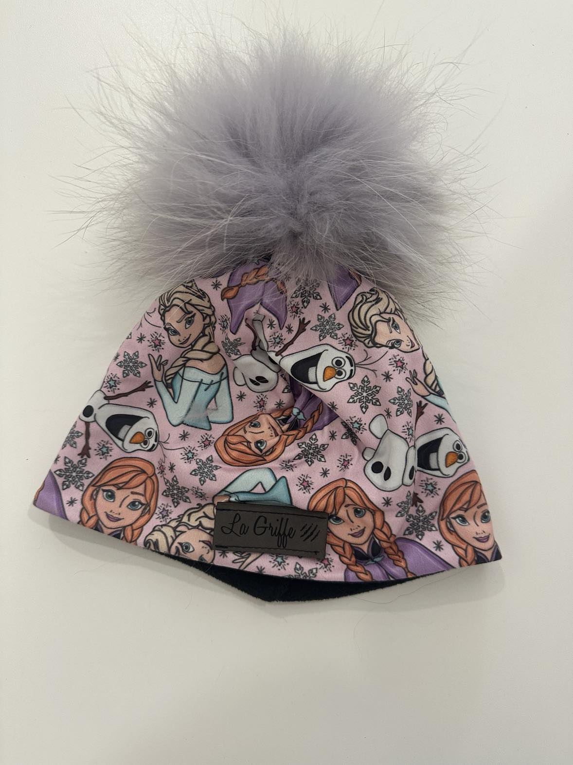 Tuque 2-5ans avec pompon mauve - Boutique friperie le placard de Jeanne et cie